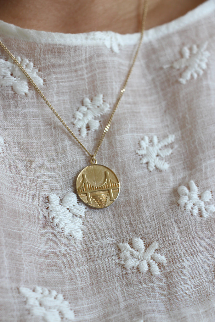 Pueblo Jewelry, in Mansur Gavriel Dress and 14k Gold Plated Coin Necklace